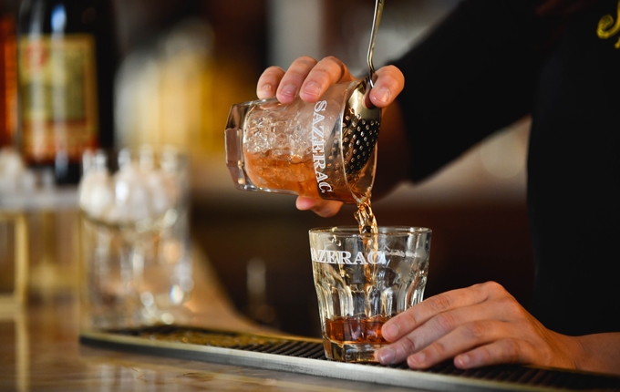 a bartender making a cocktail