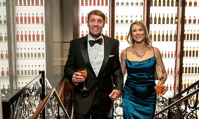 Sazerac House guests on staircase